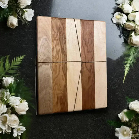 Handmade cutting board made from cherry and hard maple, eco-friendly design, 10" x 13" size, knife-friendly surface.