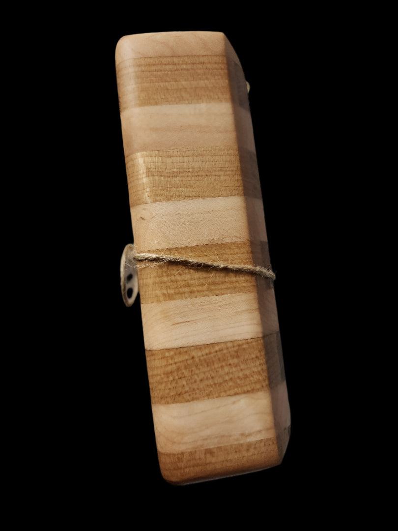Handcrafted end grain small cutting boards made from black walnut, cherry, and maple wood with a durable design.