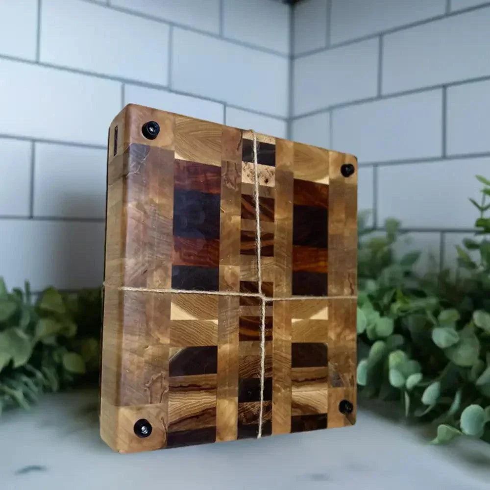 Premium butcher block with non-slip feet, crafted from Ambrosia Maple, Hickory, Black Walnut, Tigerwood, and Canarywood, 10.5"x11.5"x2.5".