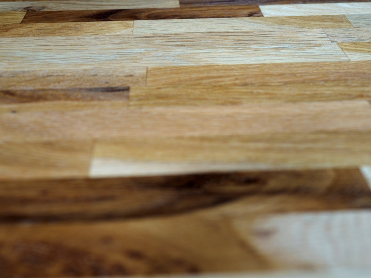 brown wooden table with white paper