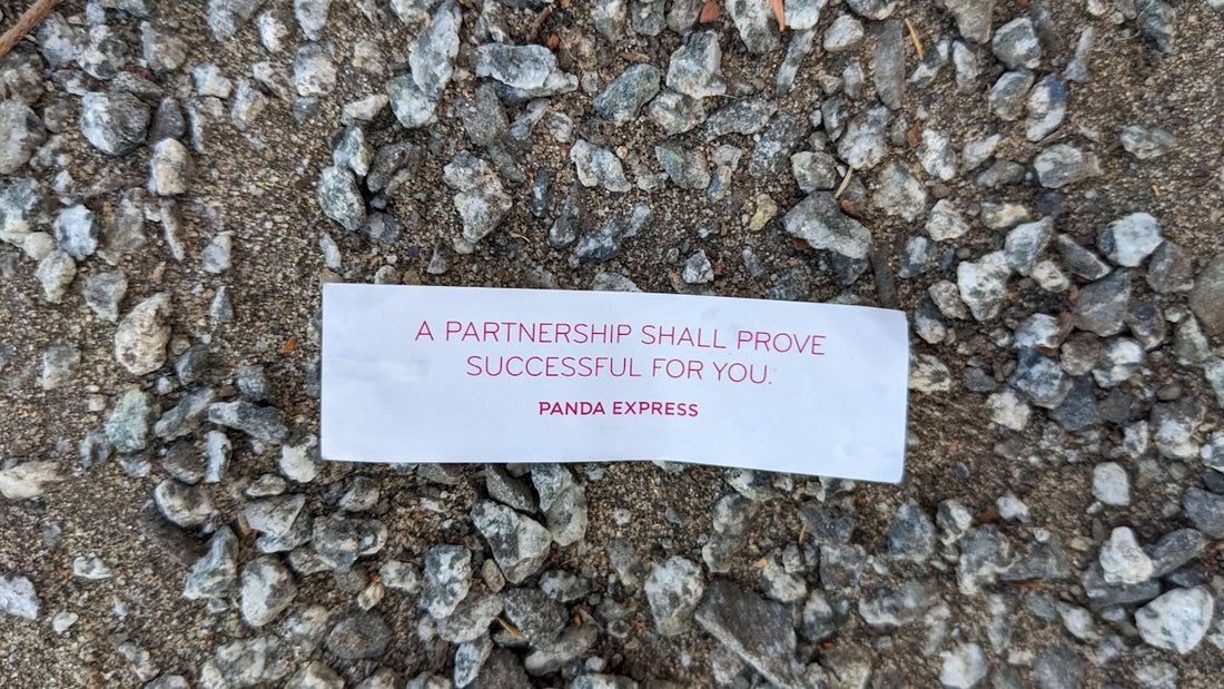 A piece of paper that is laying on the ground