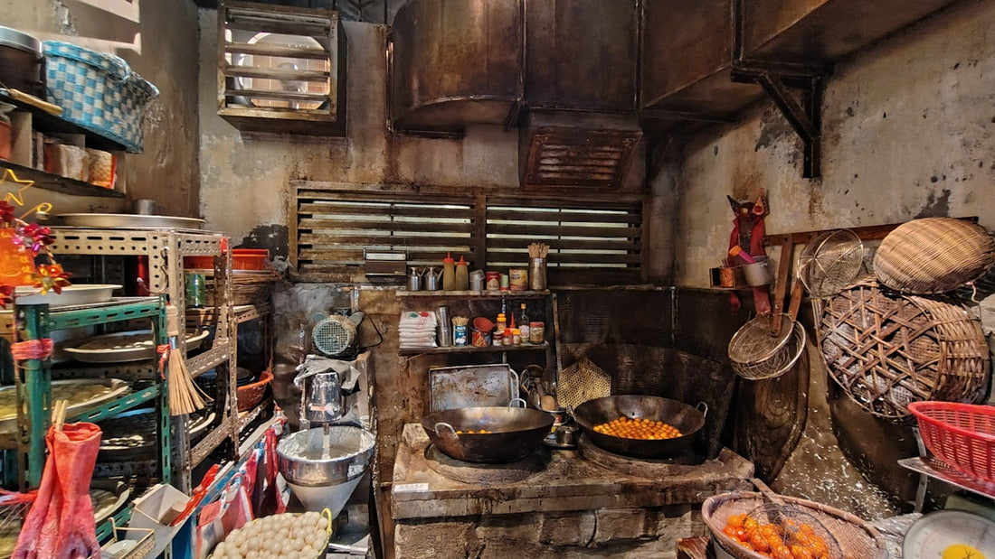 A cluttered, rustic kitchen with cooking utensils and ingredients.