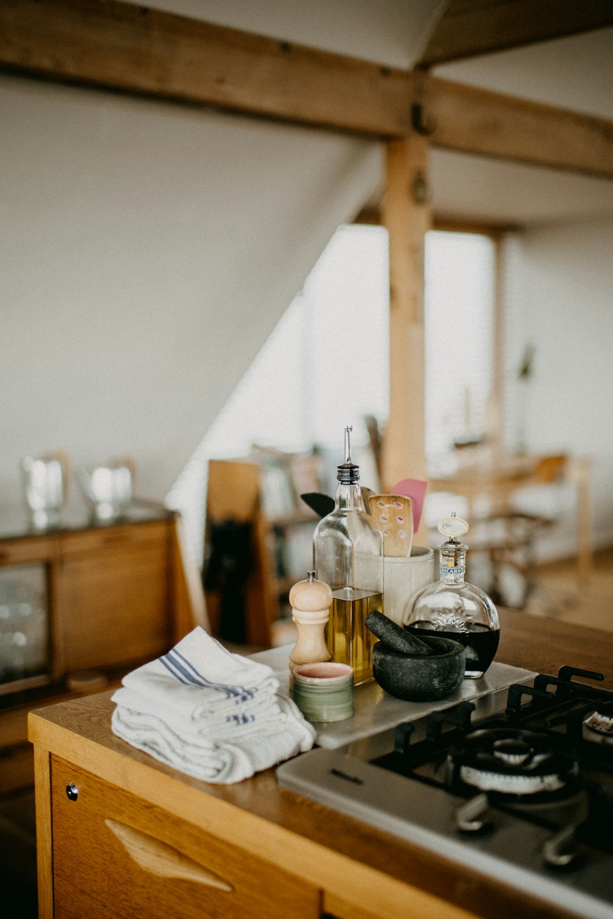 Kitchen counter with cooking ingredients and utensils.