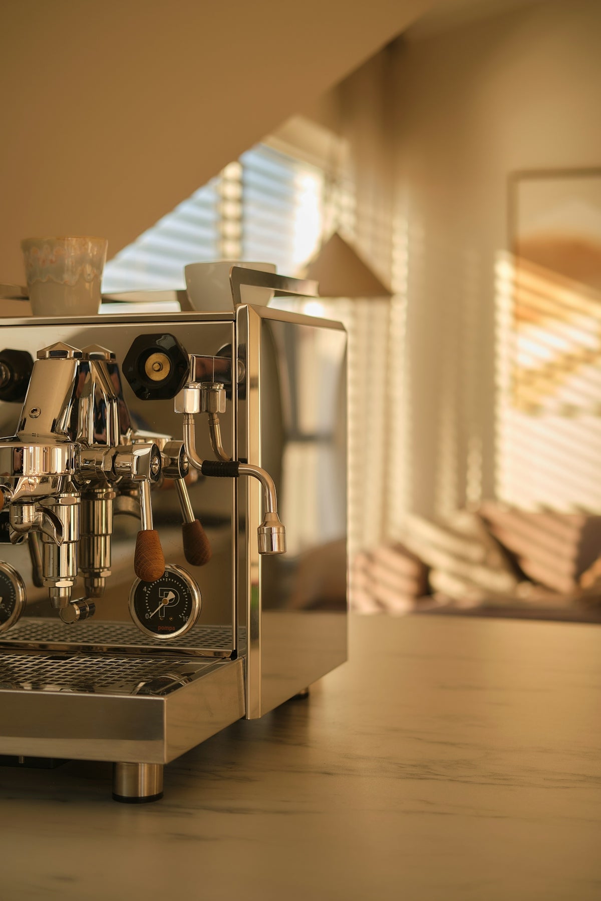 Shiny espresso machine on a kitchen counter.