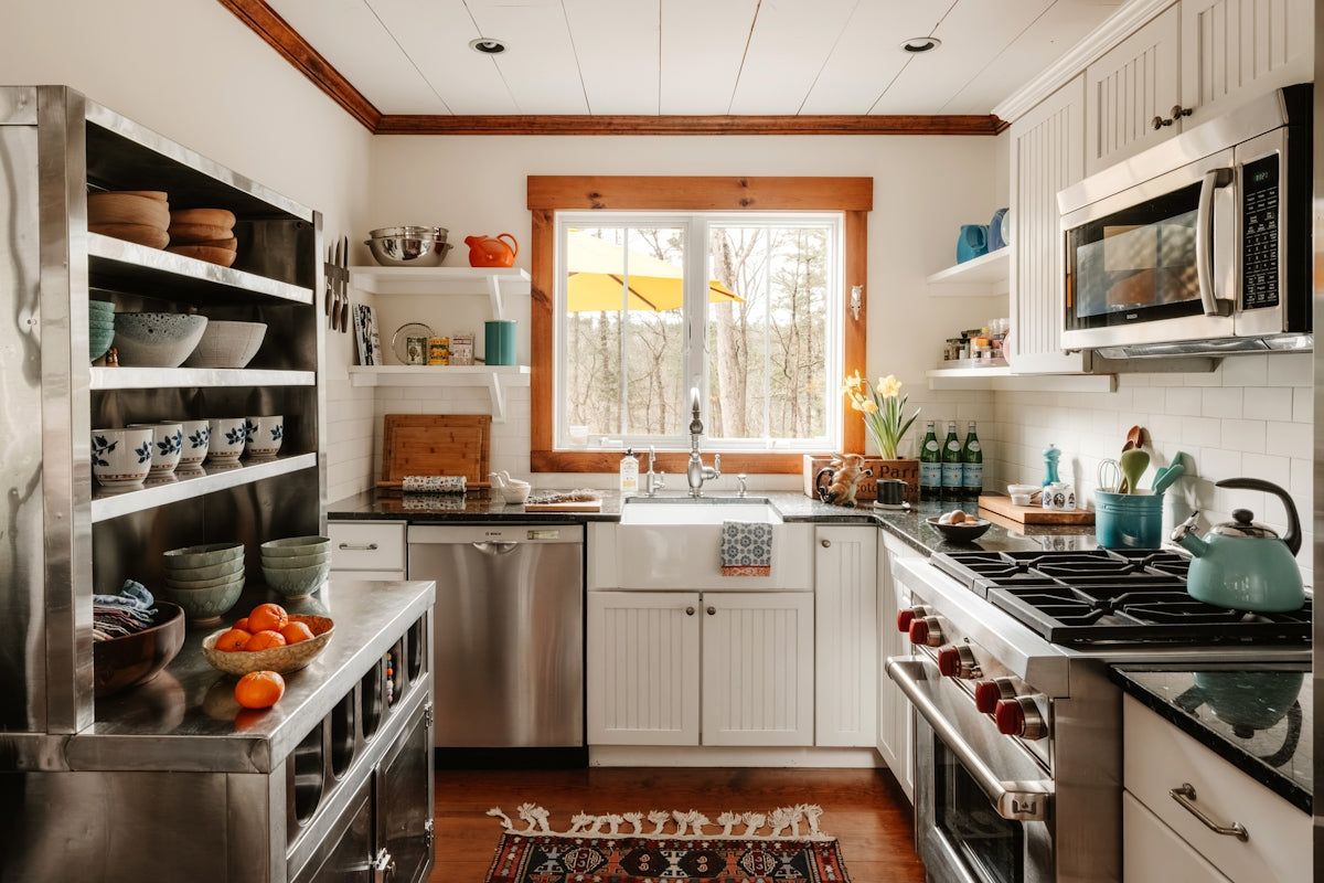 A cozy kitchen with stainless steel appliances and wooden accents.