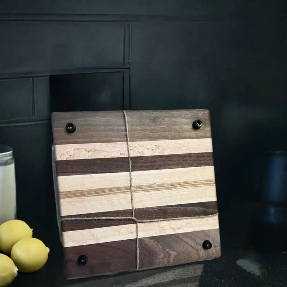 Handcrafted Black Walnut, Birdseye Maple, and Black Ash Cutting Board with Peg Feet - 10x10x0.875 Inches (SB-3730) - Stewarts Blocks and Boards