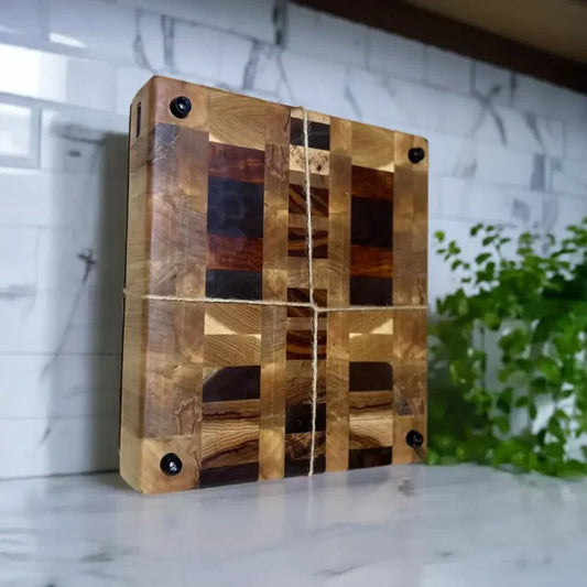 Premium butcher block chopping board with non-slip feet, crafted from Ambrosia Maple, Hickory, Black Walnut, Tigerwood, and Canarywood, 10.5"x11.5"x2.5".